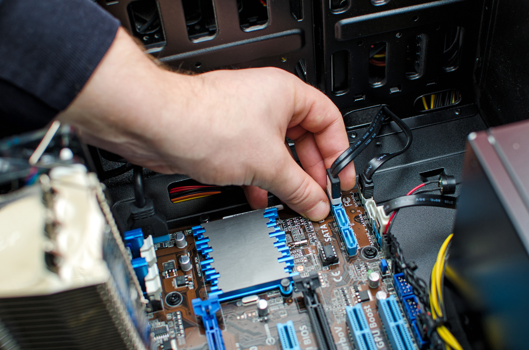 photodune 6194622 hands of technician installing hdd on motherboard m